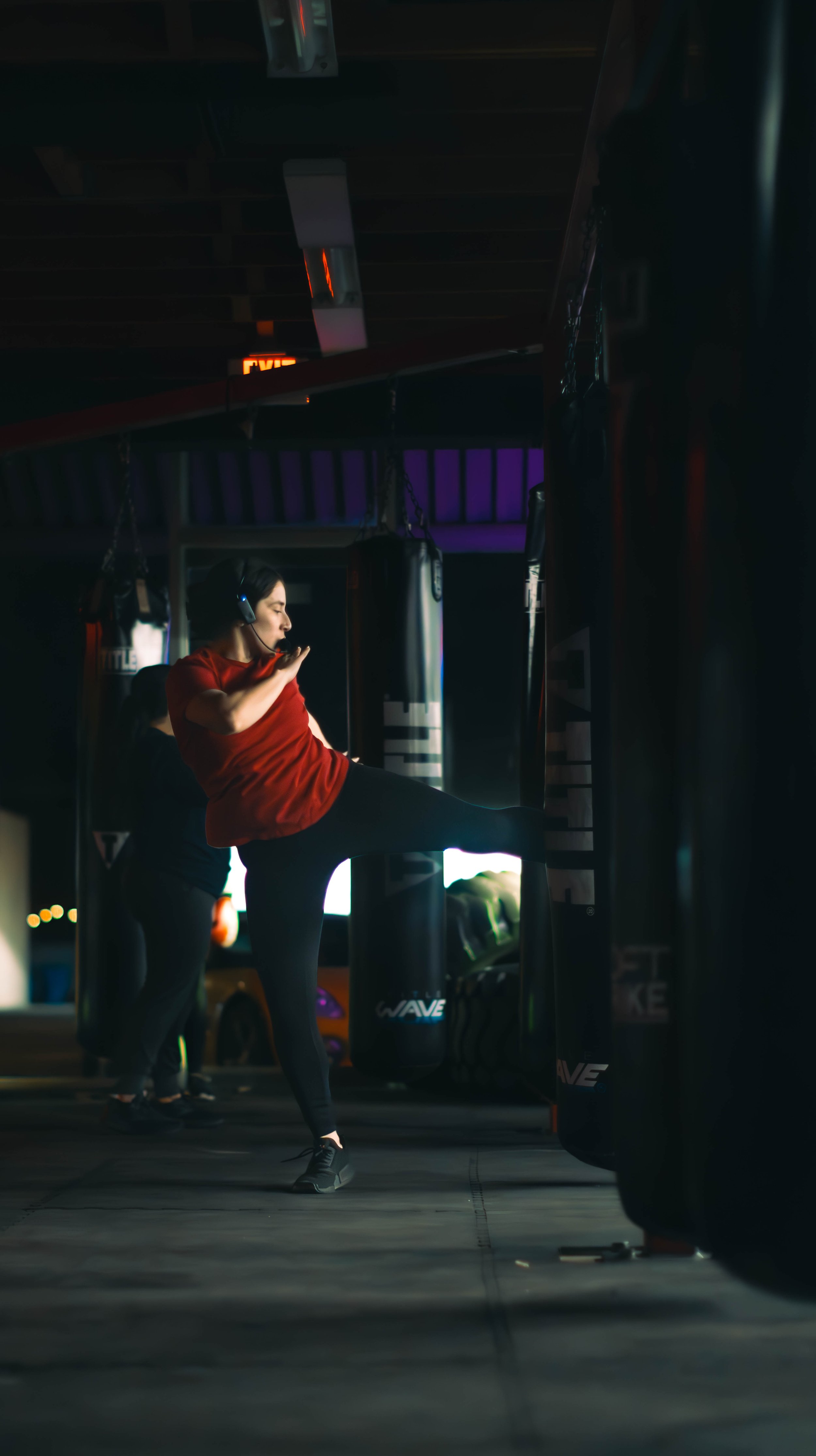 High-energy kickboxing class with punching and kicking drills