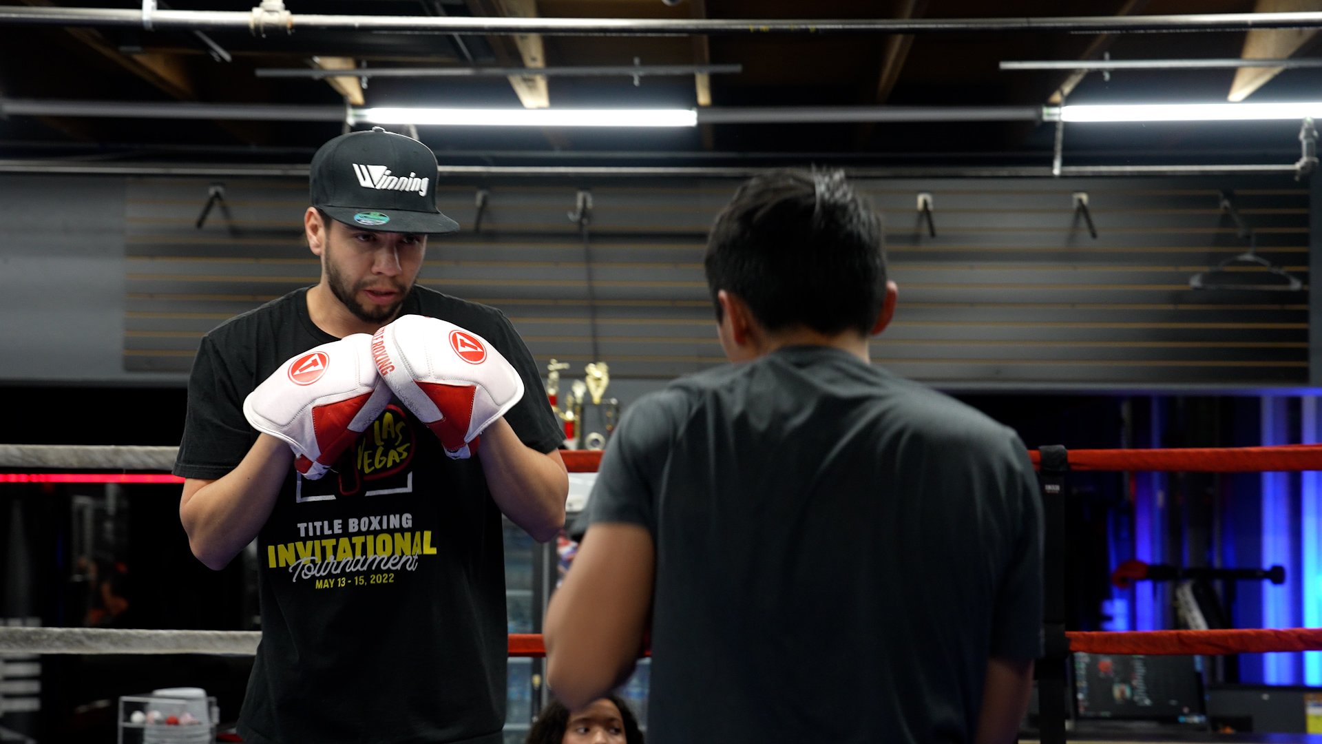 Boxing class — focus mitt training and heavy bag drills